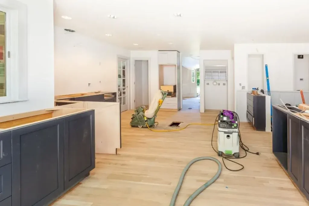 should I sand timber floors before or after a kitchen renovation
